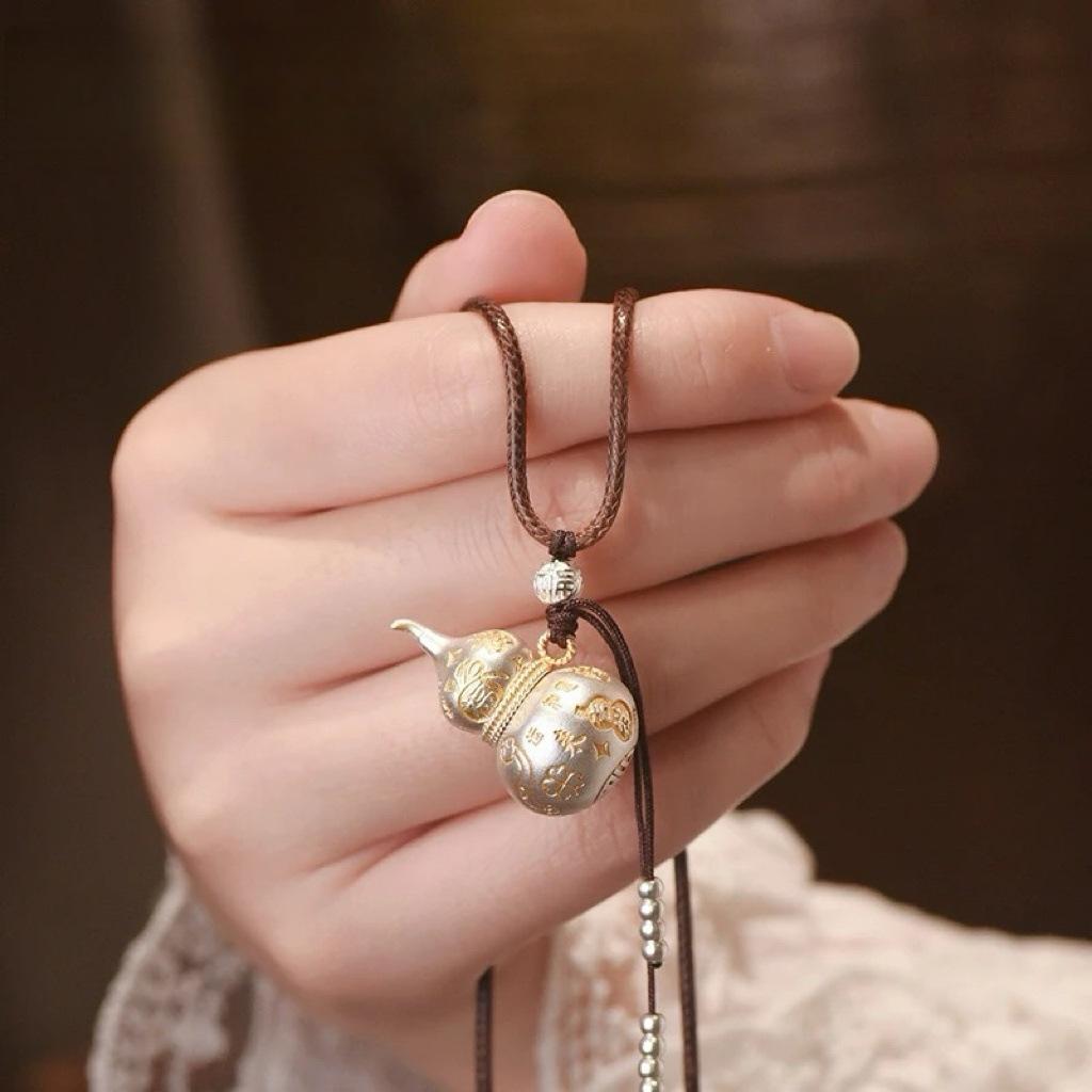 New model of auspicious golden gourd pendant necklace in traditional Chinese style, long gourd necklace for women, sweater chain, ladies' accessory