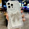 Прозрачный чехол для iPhone 16/15/14/13/12 с блестящими стразами и большим бантом.