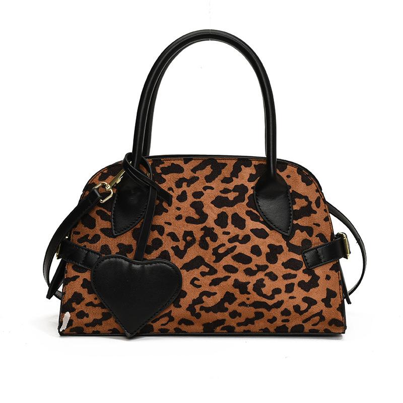 Сумка в стиле ретро с леопардовым принтом для женщин, простая и универсальная, сумка-мешок Niche Light Luxury Messenger через плечо