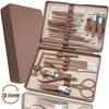 28-Piece Stainless Steel Nail Care Set: Includes Clippers, Cutters, Pedicure Tools, Eyebrow Trimmer, and Beauty Pliers In a Brown Case.