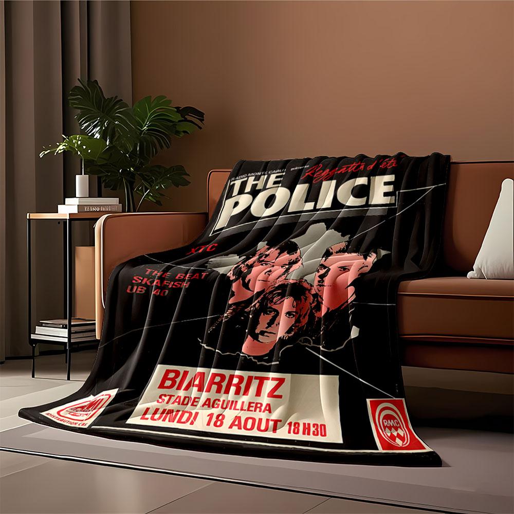A retro-style concert poster with red, black, and white text and visuals. for all seasons blanket lunch break throw gift