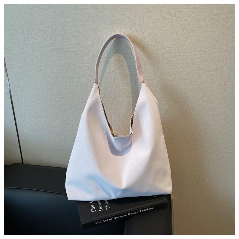 Вместительная сумка подмышку женская новая модная трендовая сумка на плечо для通勤, универсальная повседневная сумка-тоут