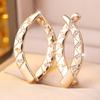 French-style diamond-patterned twisted drop earrings Champagne gold geometric earrings fully encrusted with zirconia Light luxury commuter earrings