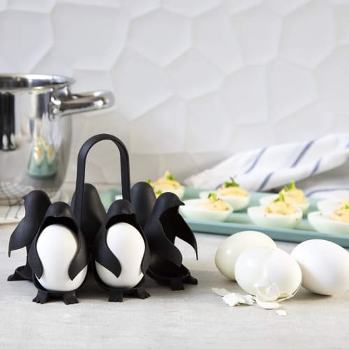 The Penguin 3-in-1 Egg Boiler is a versatile egg cooker that cooks, stores, and serves eggs. This penguin-shaped egg cooker holds six eggs for easy co