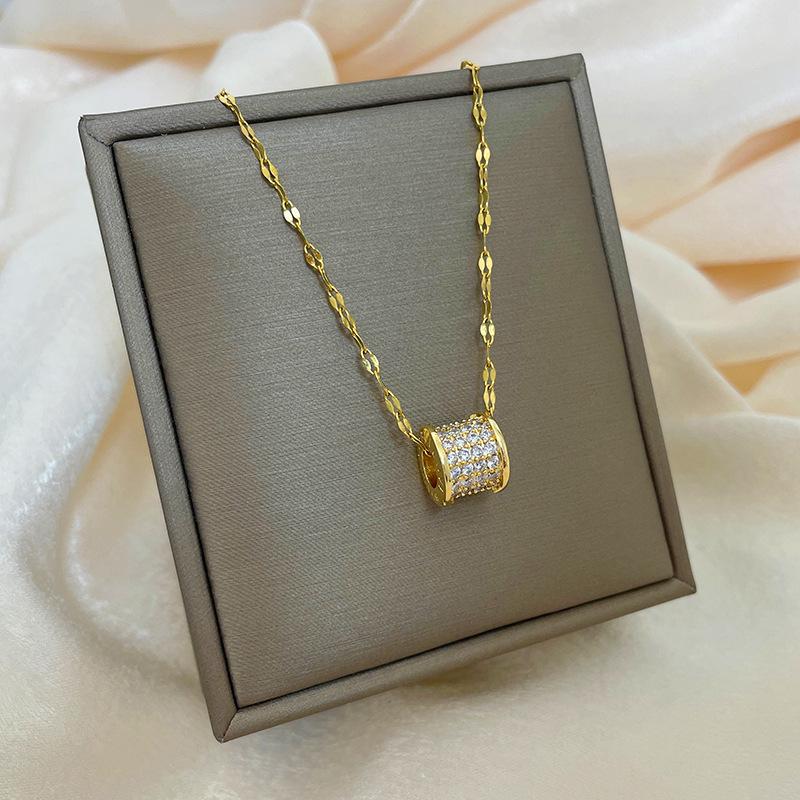 Позолоченная медь 18 карат, цепочка на ключицу с дизайном абака, тыквы-горлянки и лебедя.