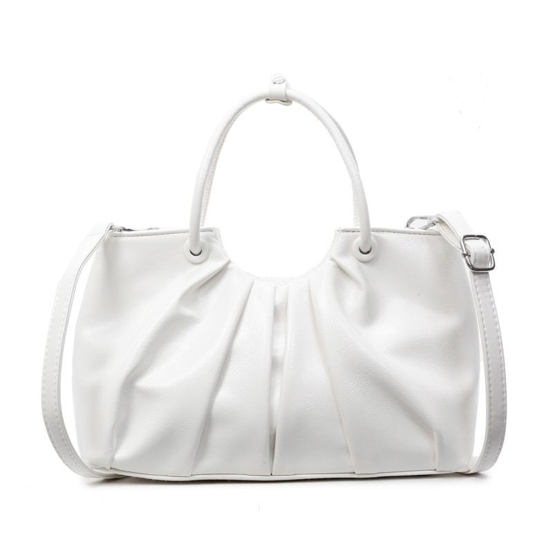 Корейская версия нишевой дизайнерской плиссированной сумки в иностранном стиле, женская универсальная сумка-мессенджер для通勤 из масляной вощеной кожи с чувством стиля