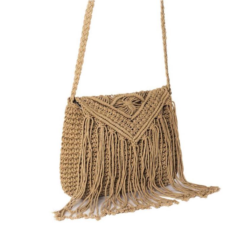 Шикарная женская сумочка с красивыми кисточками. размер сумки: 27 см * 2 см * 21 см