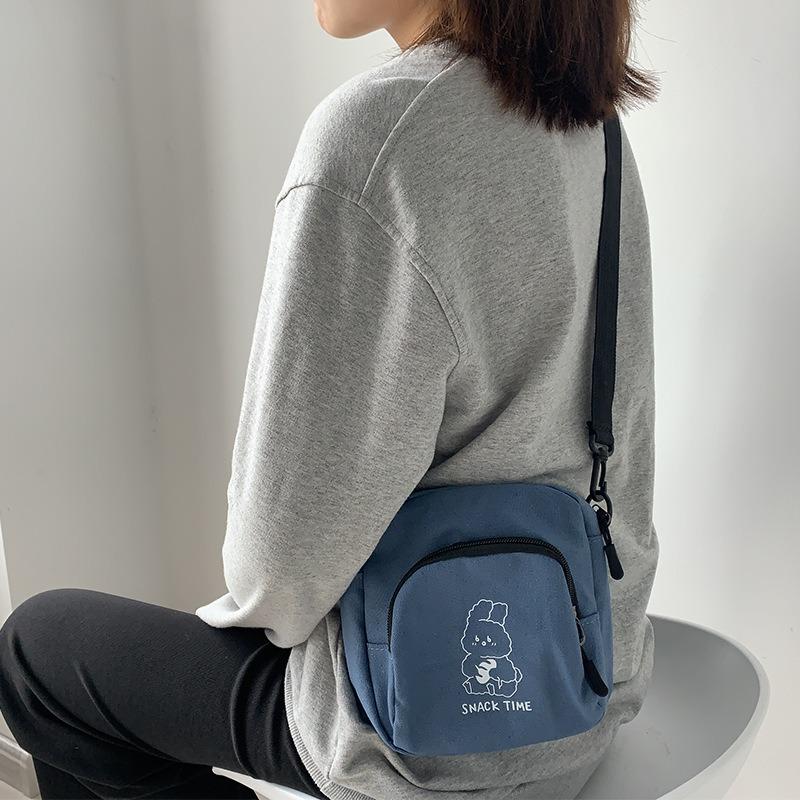 Милая маленькая сумка женская 2025 новая сумка через плечо сто с мультяжной холщовой сумкой