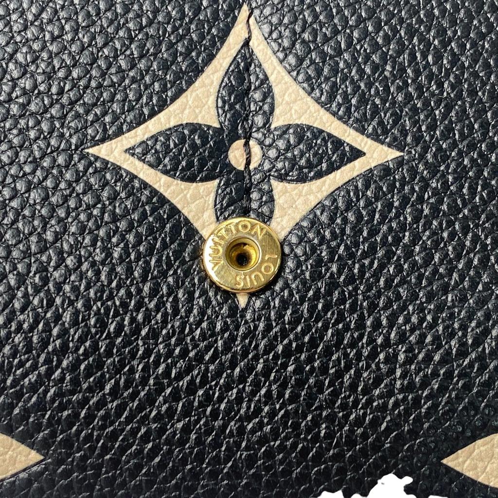 Подержанный кошелек LOUIS VUITTON Серия Black/Кремовый тип кожа Женский