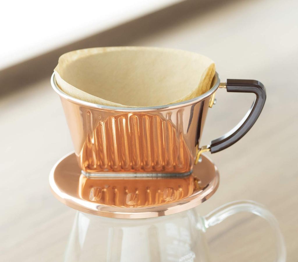 Фильтр из бумажного кофе Kalita Трапеция, которая выделяет Для 4-7 100 штук фильтра FP103 Коричневый кофе Шестидесятые Уважение к выдержанному вкусу,