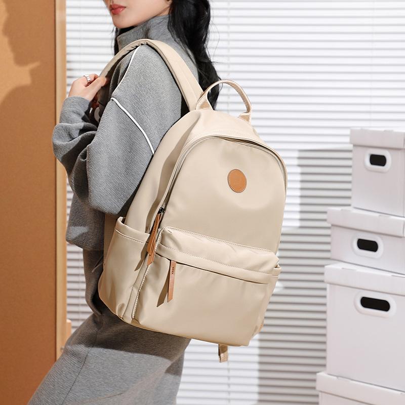 Large Capacity Oxford Cloth Backpack for Women Lightweight and Versatile New Commuting Backpack Korean Version Solid Color Travel Backpack