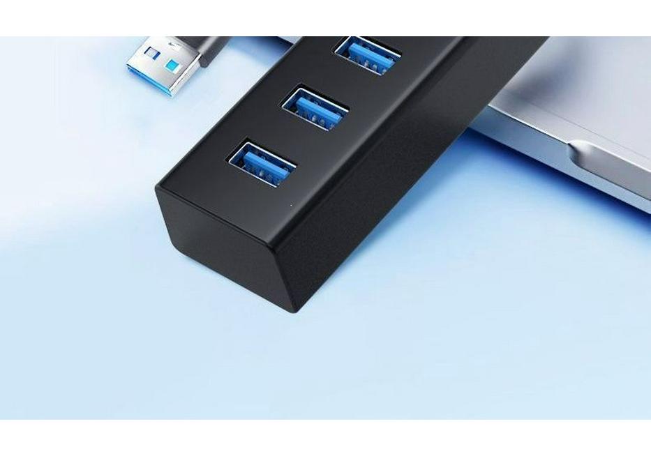 Высокоскоростной многопортовый USB 3.0 концентратор с вертикальным расширением для ноутбуков и настольных компьютеров.