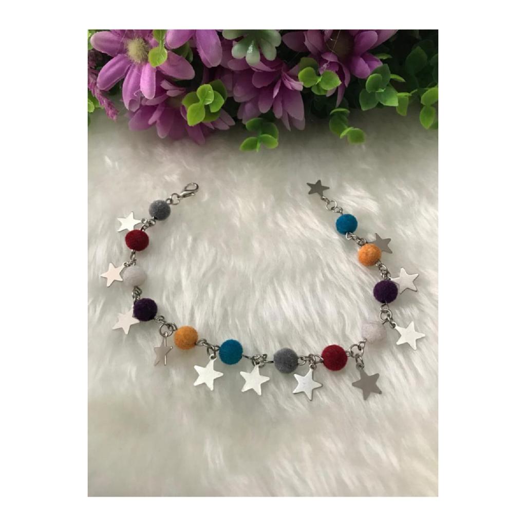 Женский браслет серого цвета со звездой