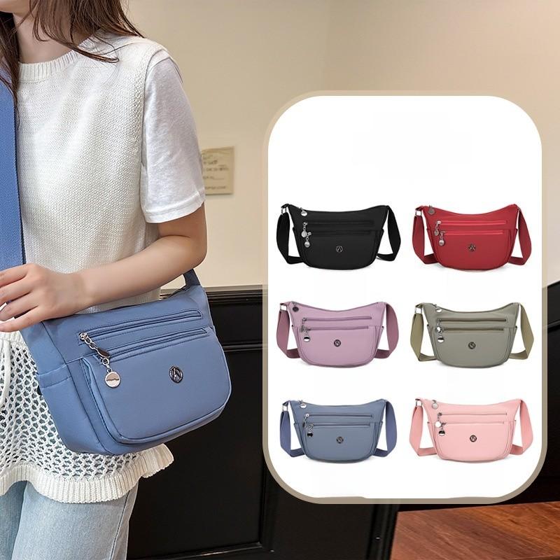 Stylish Nylon Crossbody Bag With Sewn Details And Inner Pocket For Casual Outings