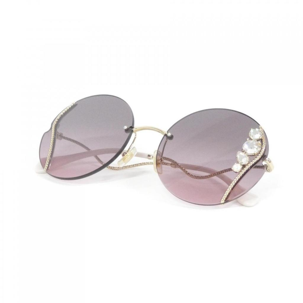 Б/у Солнцезащитные очки Miu Miu SMU50X