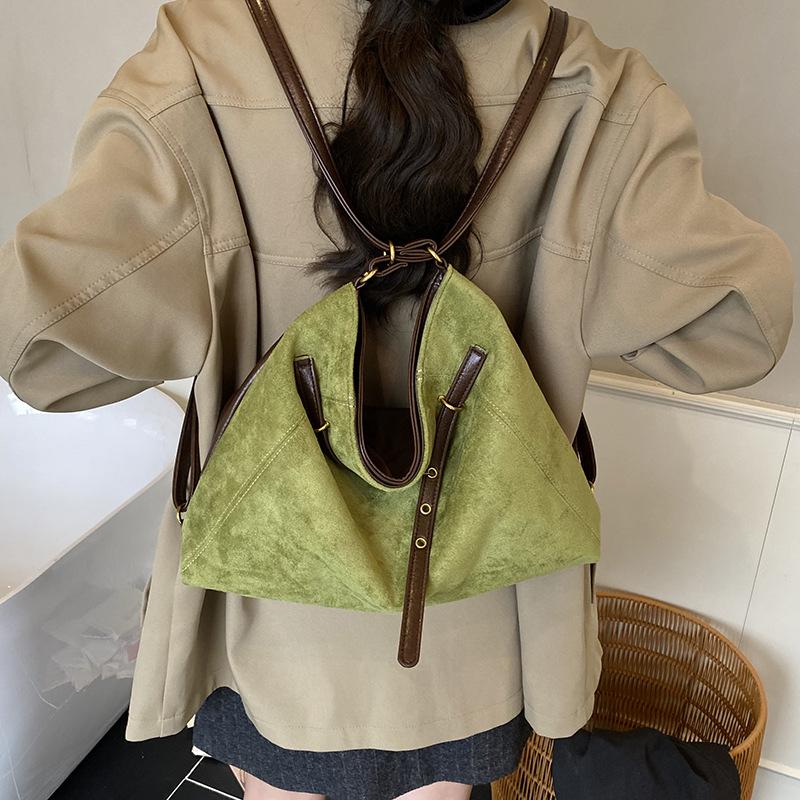 Retro commuter dumpling bag women's large capacity 2025 new niche shoulder bag multi-functional casual backpack backpack