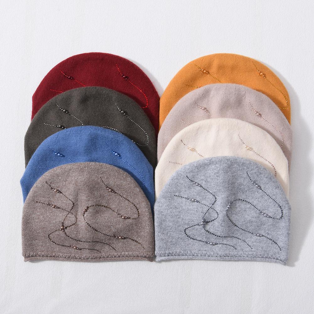 Autumn and winter new rabbit down hat small curled edge with pearl comfortable warm wool hat soft waxy knitted hat