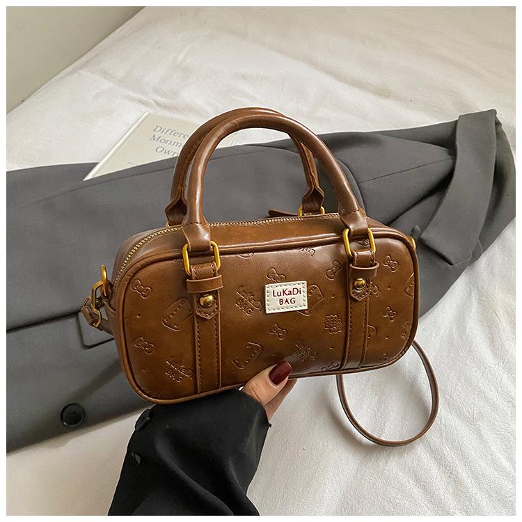 Fashion niche portable Boston bag women's 2025 new foreign retro commuter bag super fire shoulder messenger bag
