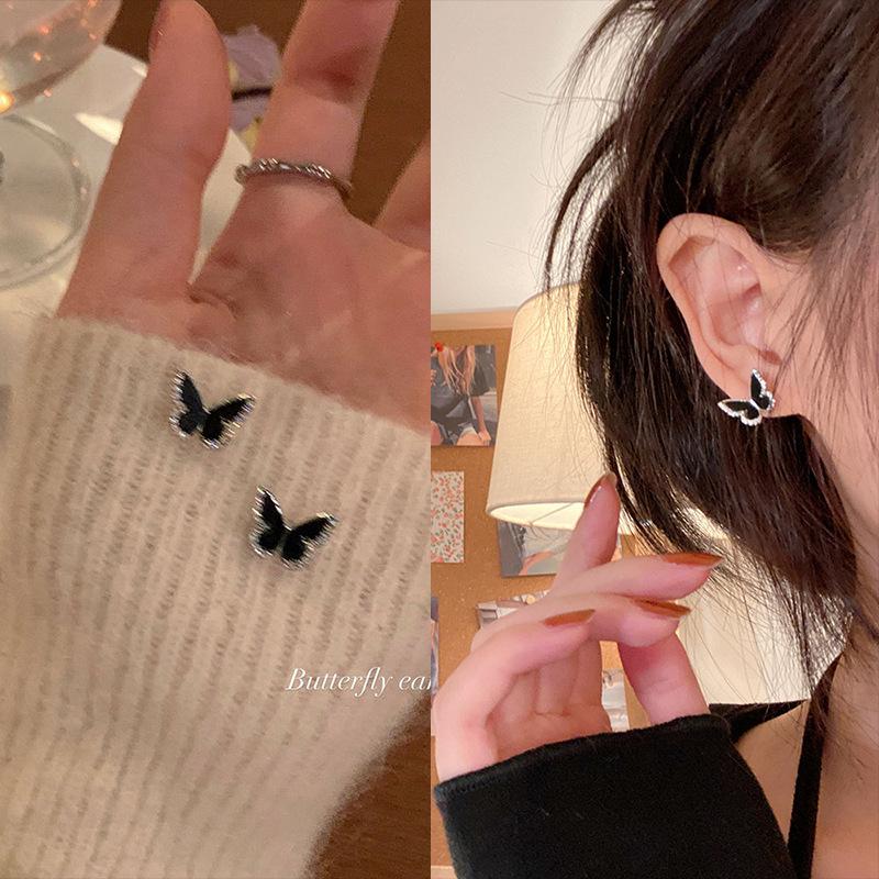 Autumn and winter black butterfly stud earrings women's new trendy niche design sense light luxury high-end earrings earrings explosion