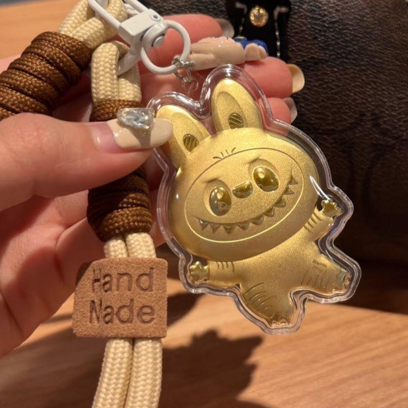 Золотой брелок Cinnamoroll и кожаная сумка для телефона с монограммой и высококачественным подвесом-шармом