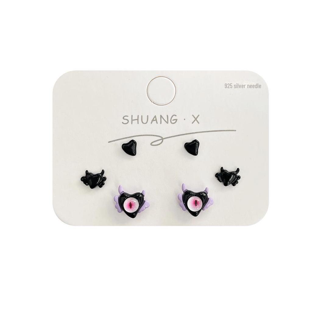 «Изысканные серьги в виде мультяшного летающего монстра — серебряные иглы, забавные и уникальные для студентов»