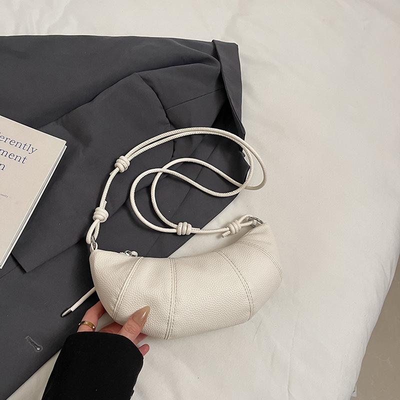 Французская нишевая сумка женская 2025 новая высококлассная на плечо сумка-мессенджер популярная весенне-летняя универсальная сумка-пельмень круассан