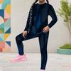 Женский костюм из двух предметов: топ с круглым вырезом и длинным рукавом с принтом и облегающие брюки