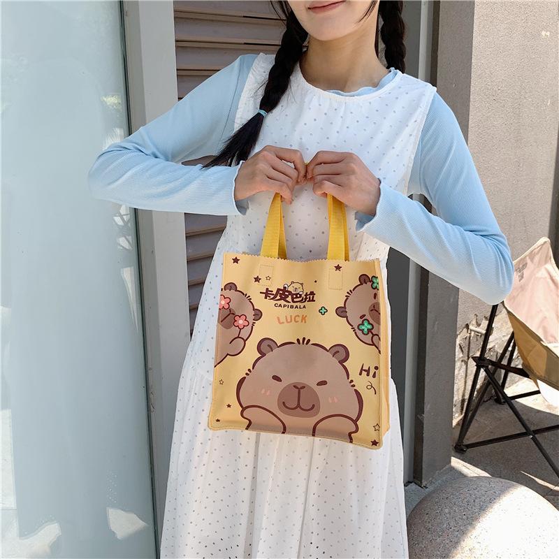 Трендовая сумка-тоут сувенир мультяшная капибара студенческая сумка большой вместимости сумка для хранения