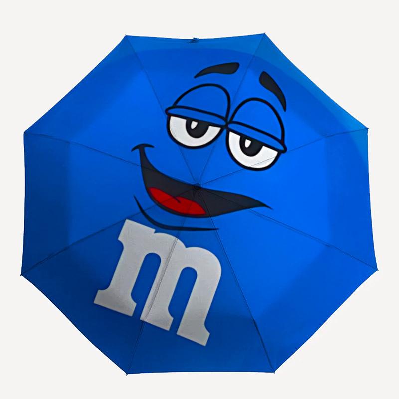 1PC Blue M&M's Character Print Umbrella, Featuring Automatic Folding, And Shielding. This Sturdy And Durable Umbrella with Eight Ribs Is Convenient fo