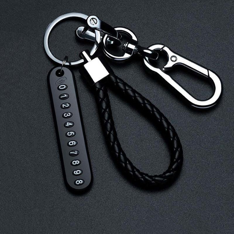 Men’s Leather Cord Keychain with Metal Anti-Lost Phone Tag and Stainless Steel Car Pendant.