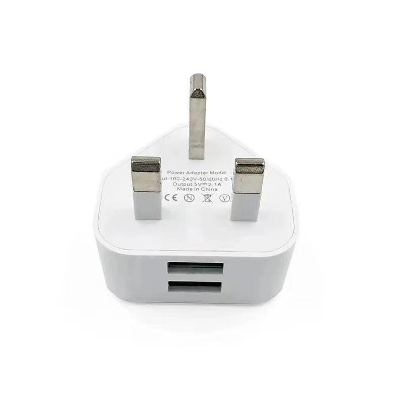 Двухпортовый USB-адаптер-зарядное устройство стандартного типа Великобритании с трехконтактной вилкой и тремя портами (Гонконгская версия) для мобильных телефонов