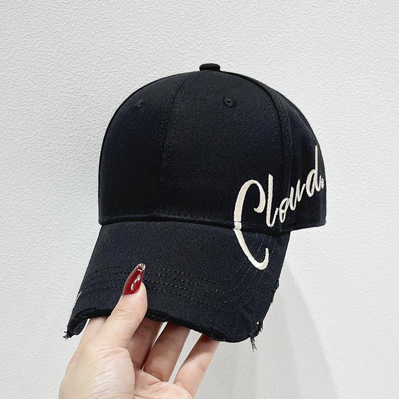 The new fashionable baseball cap is a versatile accessory for women in spring and summer. It features a large brim, which not only provides sun