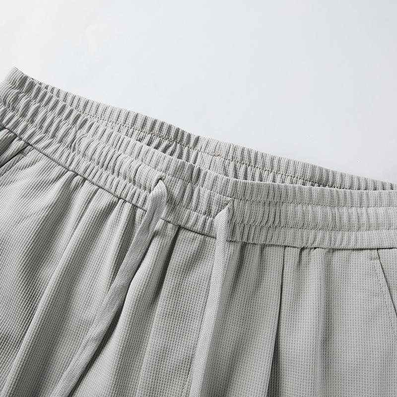 Comfortable elastic casual pants for spring and summer, new style with drawstring and elastic waistband, men's nine point pants