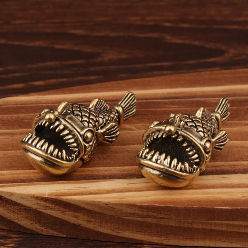 Elegant Brasses Lanterns Fish Figurine as Tabletops Decoration Adding Retros Charm to Interior Space