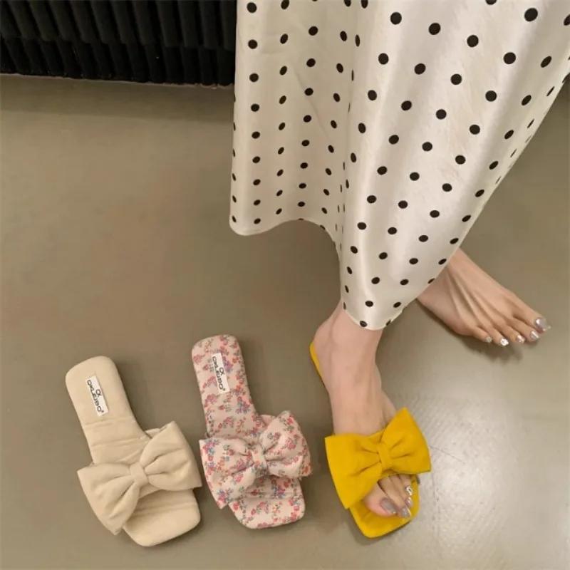 Модные женские тапочки Квадратный носок Бант-бабочка Плоская подошва Женская обувь Платье Улица Корейский стиль Лето Zapatillas De Mujer