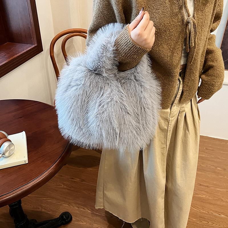 2025 new hair bag women's imitation fox hair pleated soft hand bag large capacity handbag plush bag