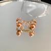 Серьги в форме барочного сердца из серебряной иглы с жемчугом и цирконами