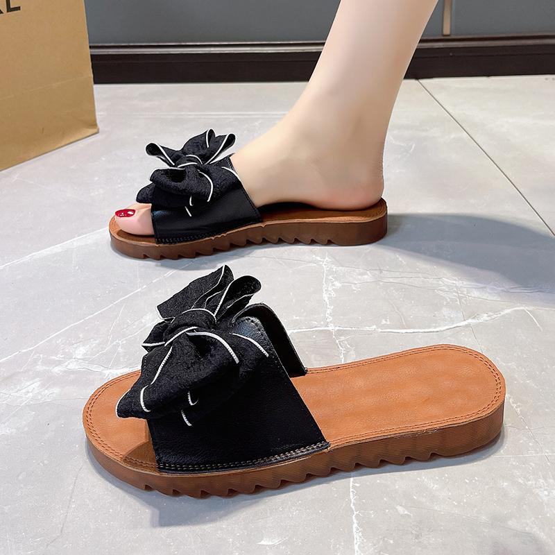 2024Крутые тапочки для женщин, носящих летние универсальные пляжные туфли с бантом и подошвой из сухожилий с плоской подошвой и нескользящие шлепанцы