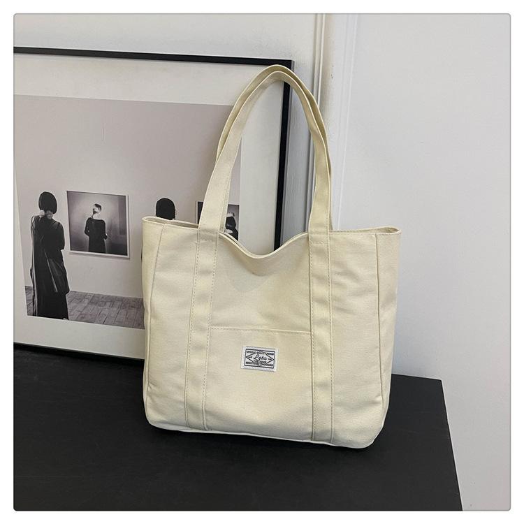 Модная холщовая сумка-тоут большой вместимости 2025 новая сумка через плечо для занятий для студента колледжа ручная сумка для поездок на работу сумочка