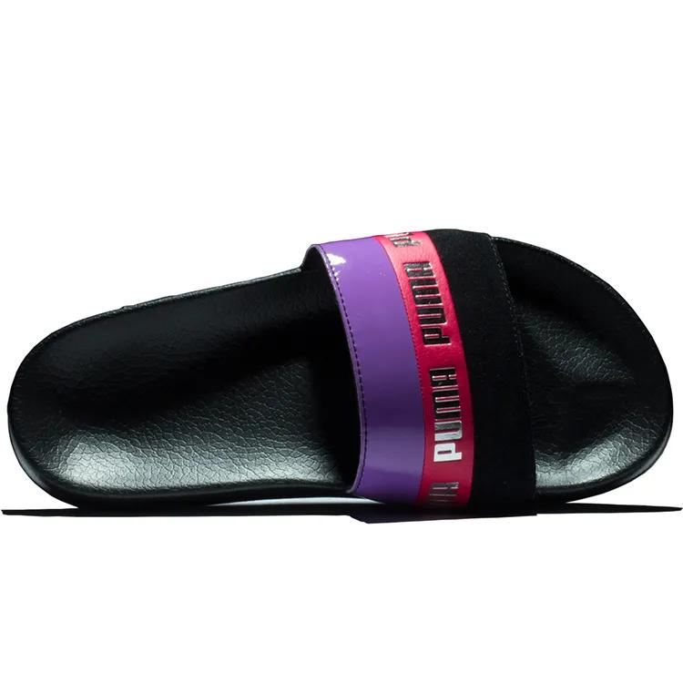 PUMA Damen Sandale Leadcat Remix Slide Black / Purple Women's (Unisex) Slide Slippers 370694 01