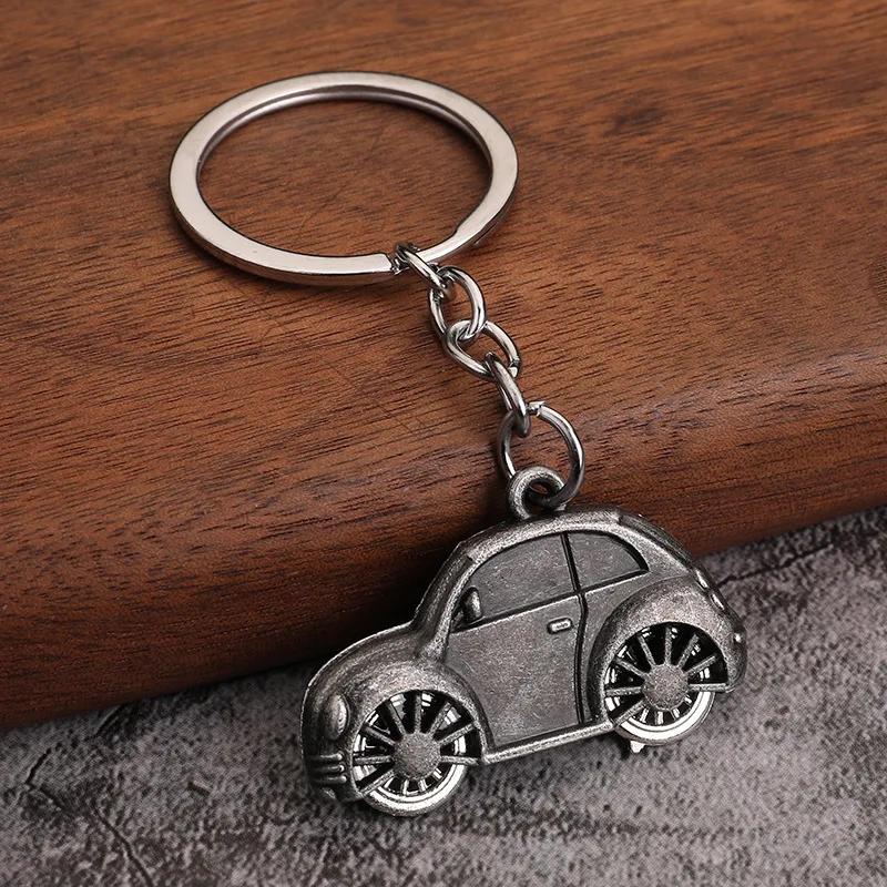 Разноцветный креативный автомобильный брелок Металлический брелок Мультяшный автомобильный кулон Маленький подарок