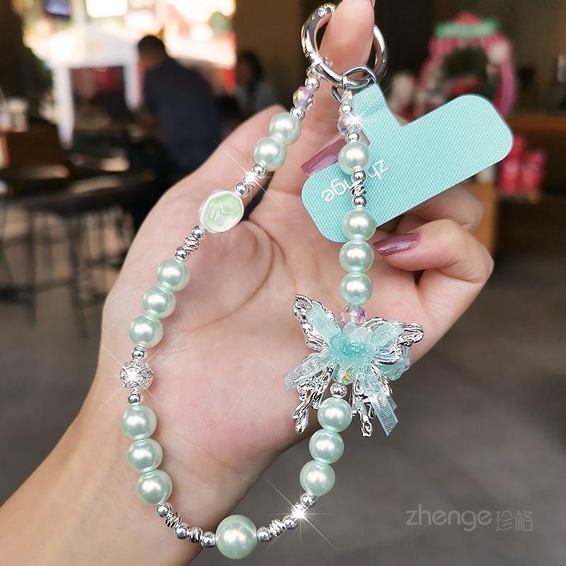 High-end gemstone butterfly pearl mobile phone chain ins fashion women's wrist pendant beaded chain short style