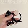 Korean High-End Four-Leaf Clover Hair Tie for Women - Non-Tightening Summer Ponytail Accessory with Black Leather Case