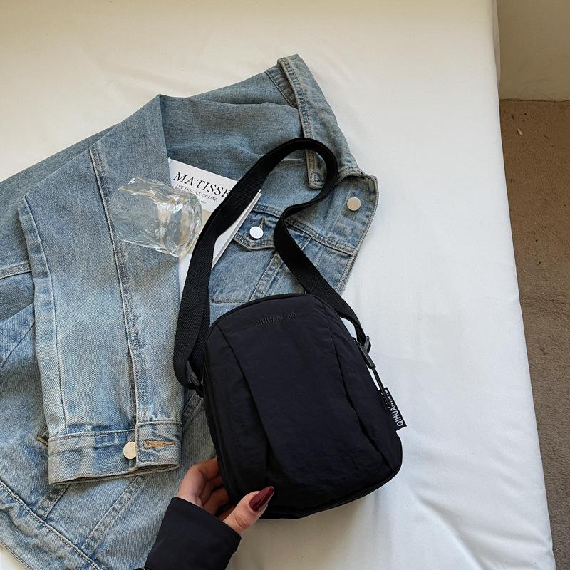 Versatile small bag Crossbody bag Women's casual canvas bag Light commuter cloth bag Men's mobile phone bag