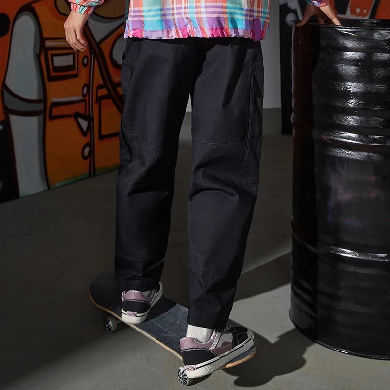 Li Ning Skateboard Series однотонные прямые повседневные длинные брюки мужские низы черного цвета AKXR445-2