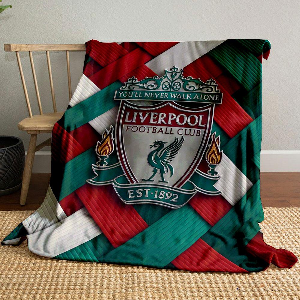 Woven red, green, and white textured pattern with a central crest. for all seasons blanket lunch break throw gift
