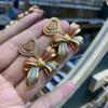 Серьги-бантики Love Bow с росписью из эмали в стиле ретро, легкие, роскошные, покрытые медью, настоящие золотые серьги Douyin высокого класса