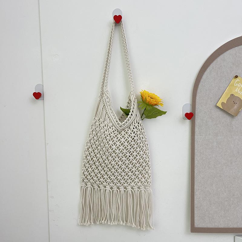 Сумка из полой хлопковой нити, плетеная, 2025 новая, на одно плечо, с кисточкой, соломенная сумка, пляжная сумка для отпуска, универсальная женская сумка под мышкой