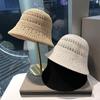 Spring and Summer New Hollow Knitted Fisherman Hat Women's Rural Vacation Bucket Hat Big Eaf Sun Protection Hat