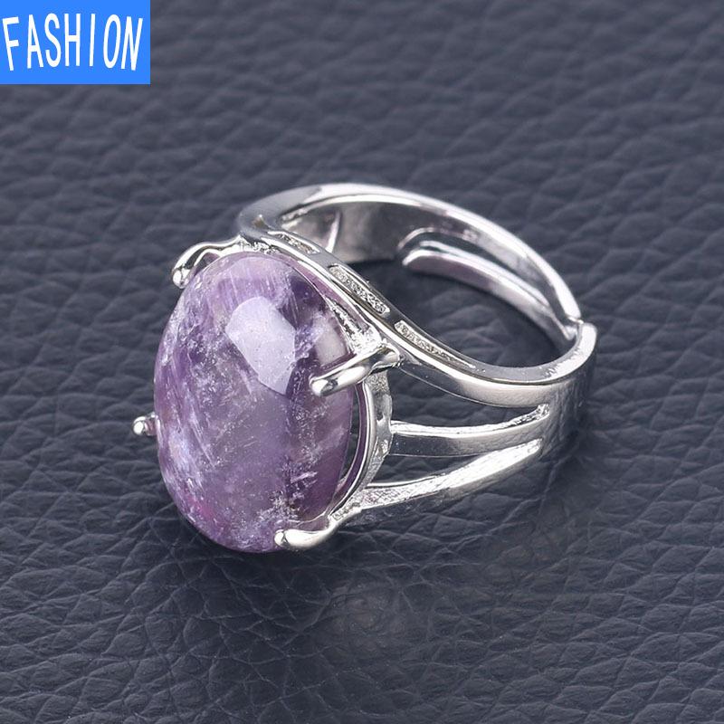 Oval Natural Crystal Four-claw Inlaid Hollow Ring